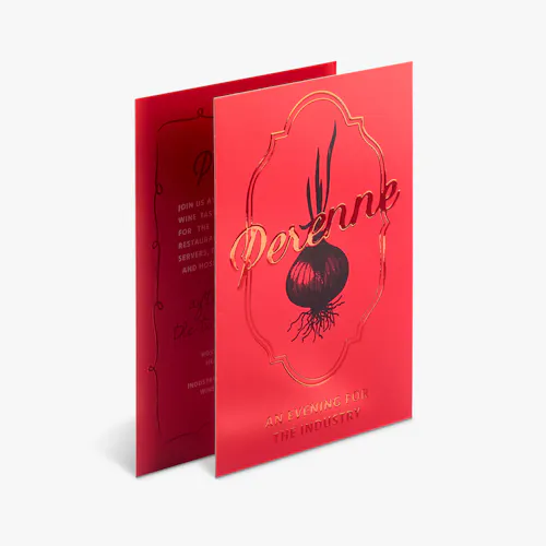 Red Raised Foil Card Two custom cards overlapping each other and printed with raised foil accents.