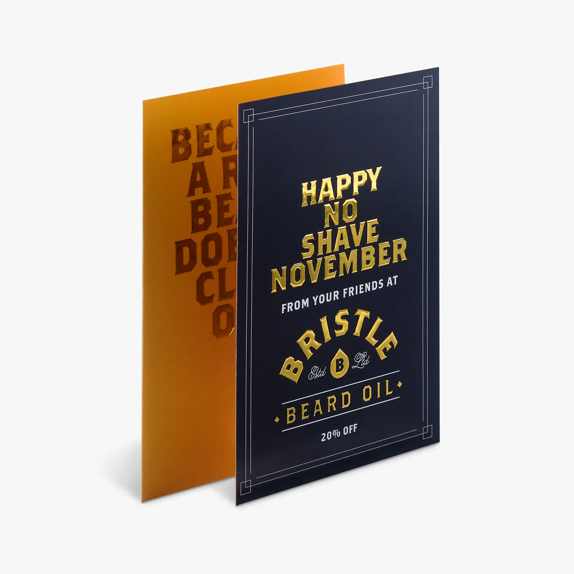 Two foil postcards overlapping each other and printed with gold foil lettering.