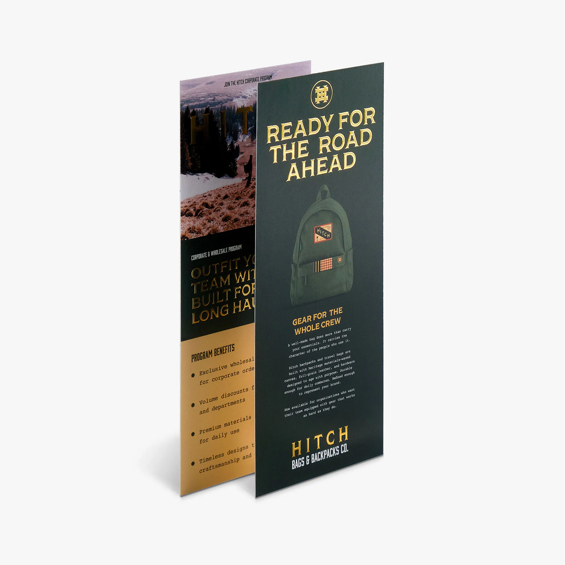 Two rack cards printed with a dark green and gold raised foil design.