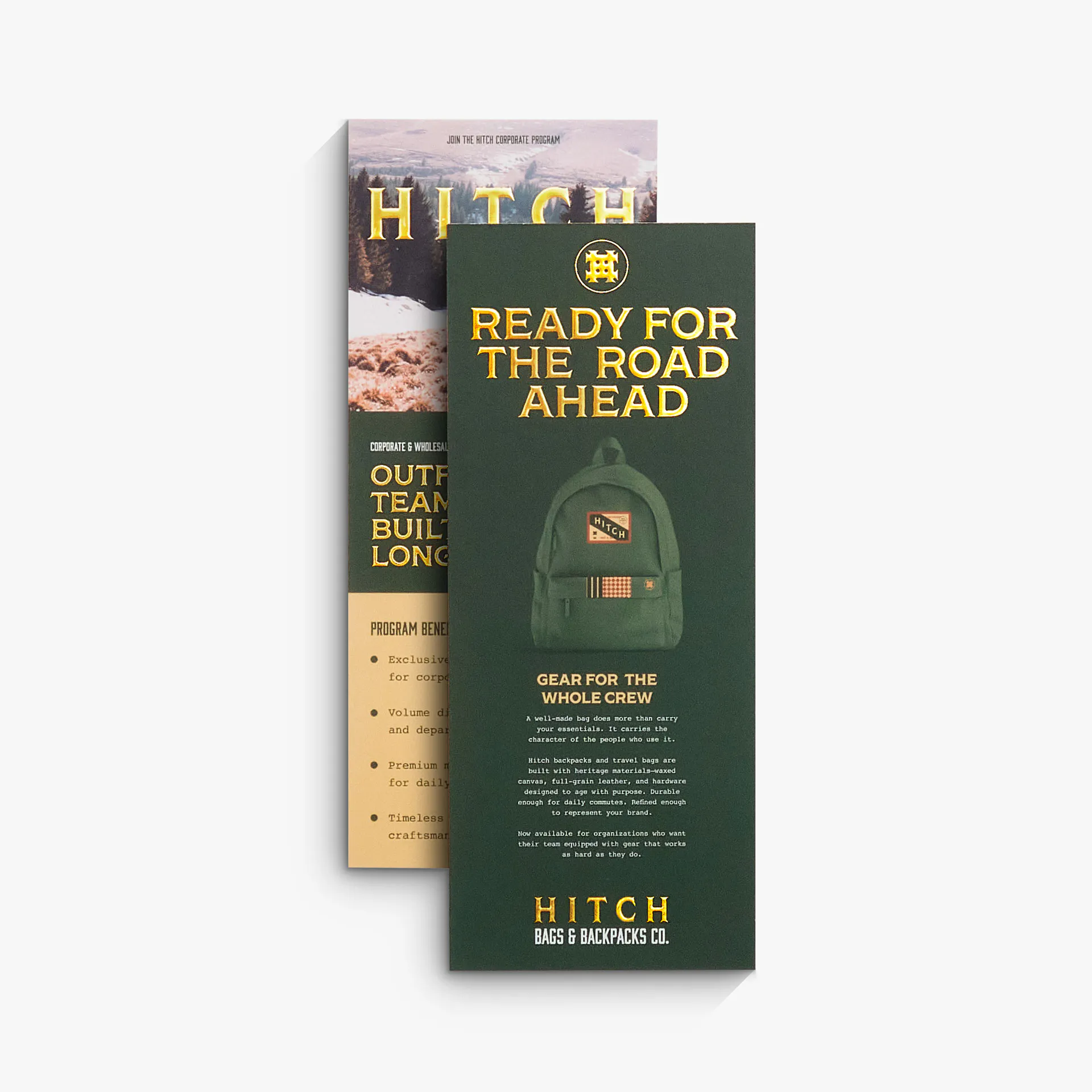 Two custom rack cards printed with a dark green design and gold raised foil.